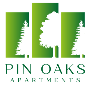 Pin Oaks Apartments logo